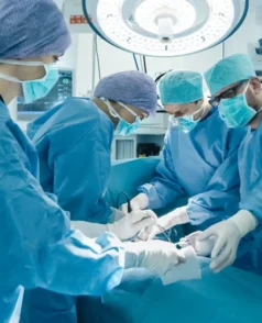 stock-photo-medical-team-performing-surgical-operation-in-bright-modern-operating-room-7414338551 stock-photo-medical-team-performing-surgical-operation-in-bright-modern-operating-room-7414338551